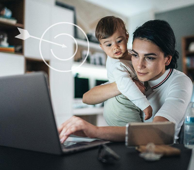 Woman with child at computer